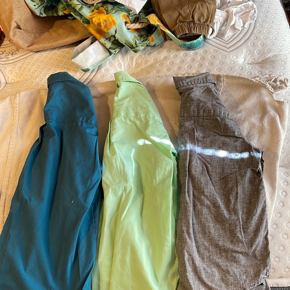 3 buttons down shirts, sold together. Size 6/7 no stains or rips.